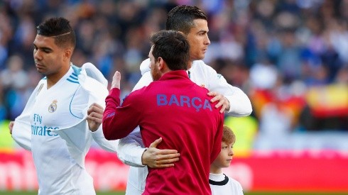 RIVALES DE CLÁSICO. Messi y Cristiano Ronaldo en el último Real Madrid-Barcelona (Foto: Getty).
