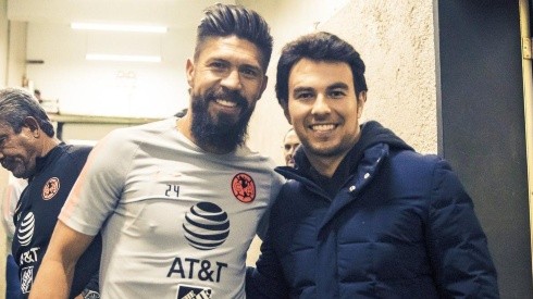 Checo Pérez junto a Oribe Peralta en CU.