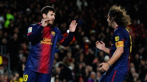 Puyol y Messi, juntos en Barcelona.