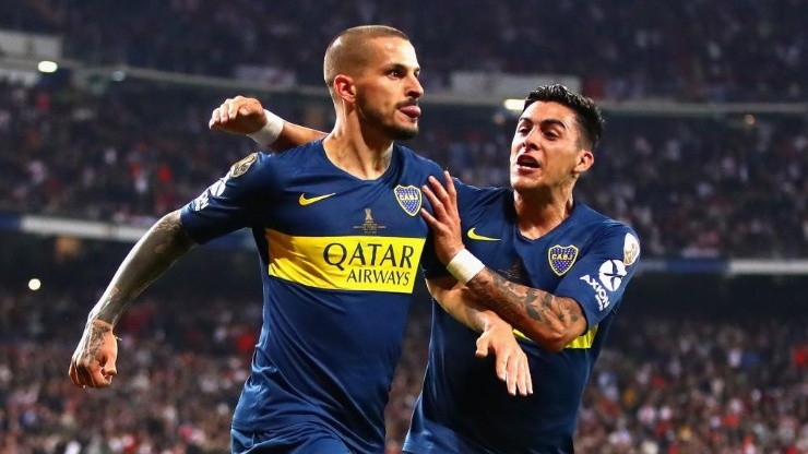 Pavón y Benedetto festejan el gol de éste último en el Bernabéu. (Getty)