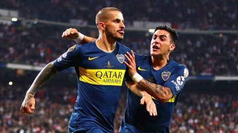 Pavón y Benedetto festejan el gol de éste último en el Bernabéu. (Getty)