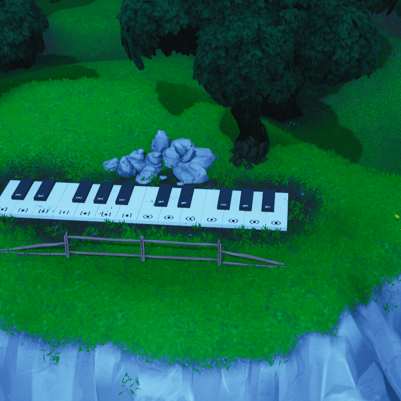 Visita un teléfono enorme, un piano muy grande y un trofeo de pez bailarín gigante en Fortnite - Desafíos Semanales