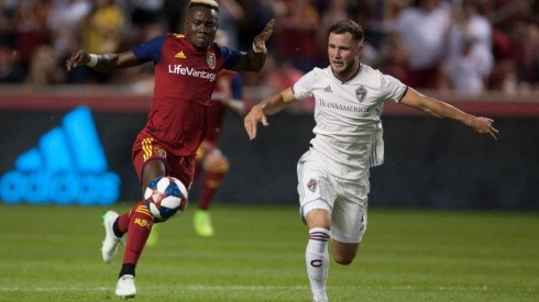 Sam Johnson of Real Salt Lake rushes the ball up the field against Keegan Rosenberry of the Colorado Rapids (Getty).