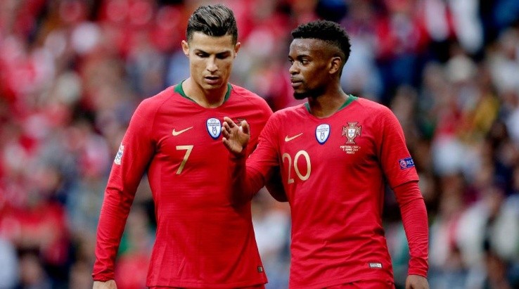 Nelson Semedo con Cristiano Ronaldo | Getty