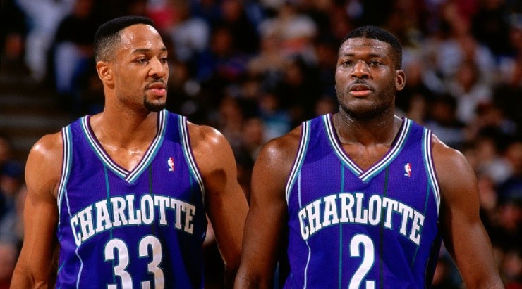 Larry Johnson & Alonzo Mourning were a dominant frontcourt. (Getty)