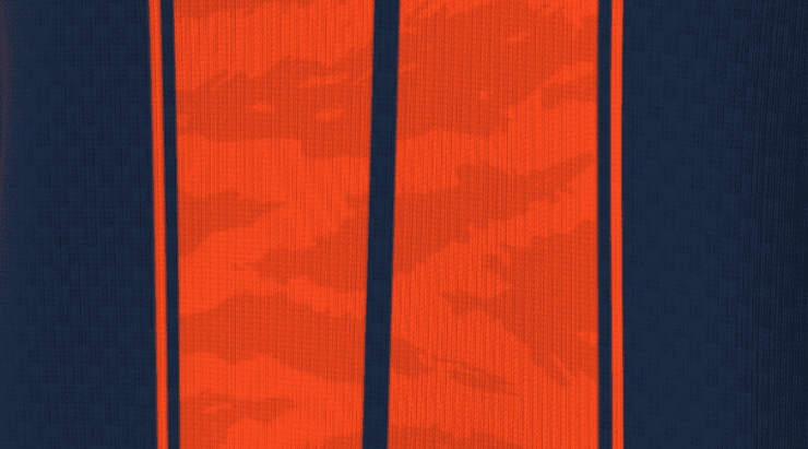 The tiger stripes along the lines of the jersey.