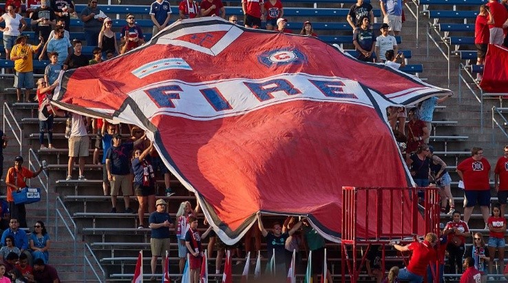 Chicago Fire fans unfurl a giant Chicago Fire jersey in game action during a MLS match. (Getty)