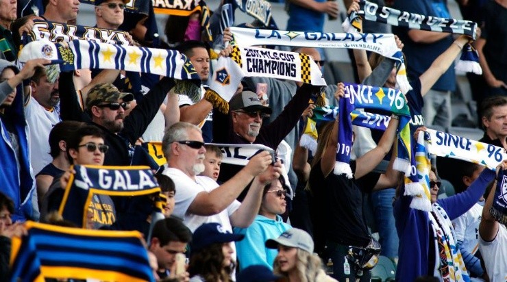 Los Angeles Galaxy fans hold up their scarves ahead of a game against Real Salt Lake. (Getty)
