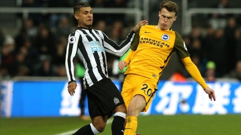 Deandre Yedlin of Newcastle (left) is challenging Solly March of Brighton (right). (Getty)