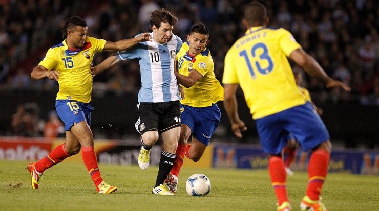 Lionel Messi dribbling past various Ecuadorian players in World Cup Qualification in 2012. (Getty)