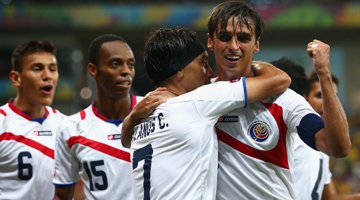 Bryan Ruiz (R) celebrates with Christian Bolanos of Costa Rica scoring his team&#039;s first goal during the 2014 FIFA World Cup. (Getty)