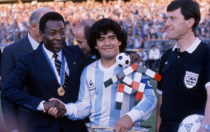 Pelé of Brazil shankes hands with Diego Maradona of Argentina