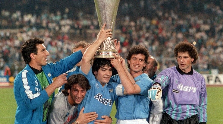 SSC Napoli celebrate their victory with the trophy during the UEFA Cup Final Second Leg. (Getty)
