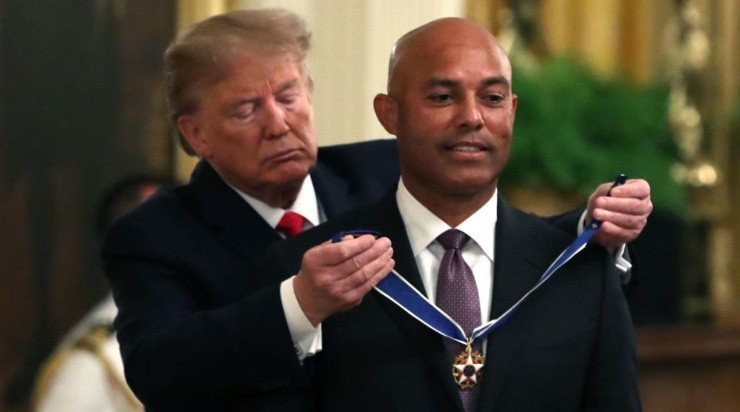 President Donald Trump (L) presents the Presidential Medal of Freedom to former New York Yankees player Mariano Rivera 