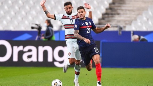 Bruno Fernandes of Portugal (left) and Lucas Hernandez of France (right). (Getty)