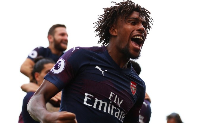 Alex Iwobi of Arsenal celebrates after his team’s second goal vs Fulham. (Getty)