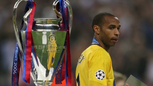 A dejected Thierry Henry of Arsenal walks past the UEFA Champions League trophy after defeat vs Barcelona. (Getty)