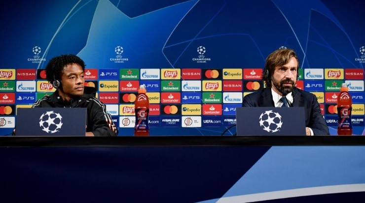 Juan Guillermo Cuadrado y Andrea Pirlo. (Getty Images).