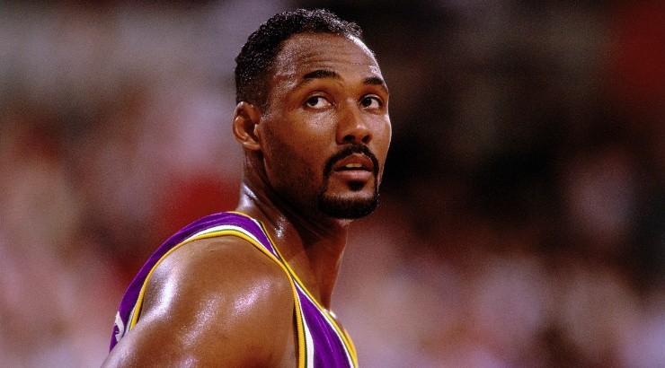 Karl Malone of the Utah Jazz looks up at the scoreboard during a game played in 1992. (Getty)