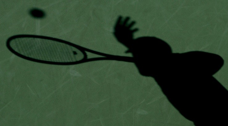 Brian Baker serves to Xavier Malisse of Belgium during the second round of the US Open. (Getty).jpg
