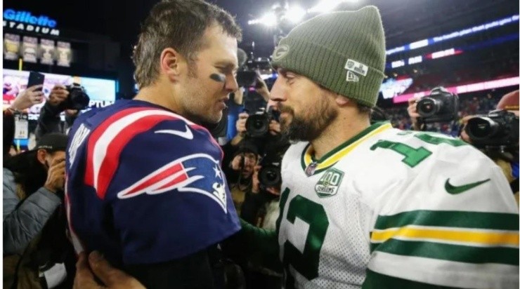 Tom Brady #12 of the New England Patriots talks with Aaron Rodgers #12 of the Green Bay Packers after the Patriots defeated the Packers 31-17 at Gillette Stadium on November 4, 2018 (Getty)