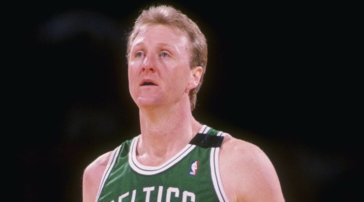 Larry Bird of the Boston Celtics stands on the court during a game. (Getty)