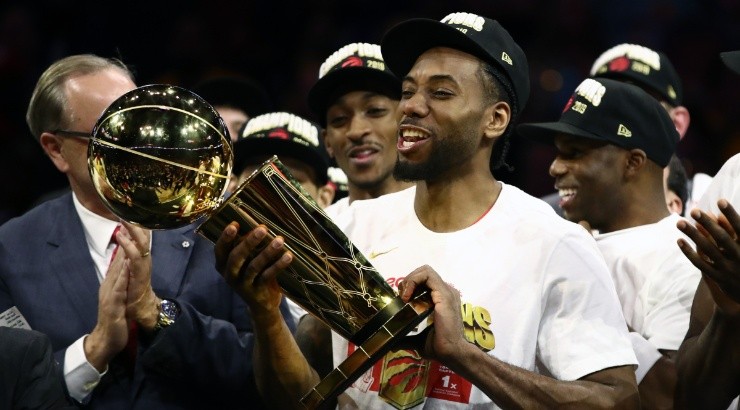 Kawhi Leonard celebrates with the NBA trophy in 2019. (Getty)