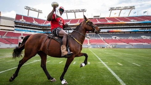 Devin White rides horse