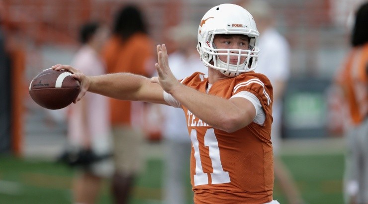 Sam Ehlinger of the Texas Longhorns warms up before the game against the Oklahoma State Cowboys. (Getty)