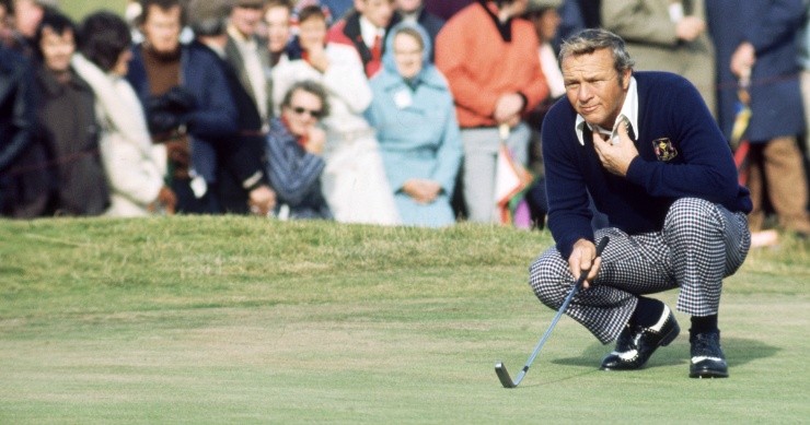 Arnold Palmer of the USA lines up a putt during the Ryder Cup in 1973. (Getty)