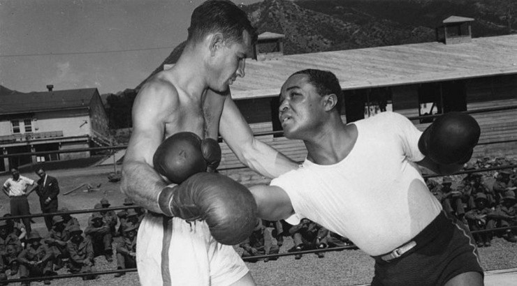 Henry Armstrong of the USA during a fight. (Wikipedia)