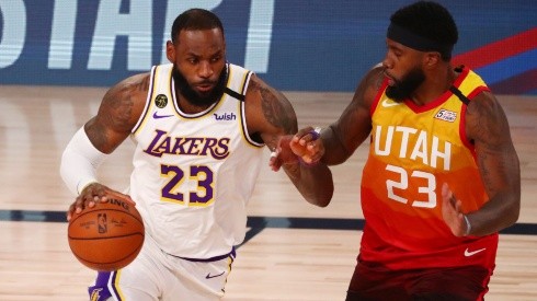 LeBron James (left) of the Los Angeles Lakers drives against Royce O'Neale (right) of the Utah Jazz. (Getty)