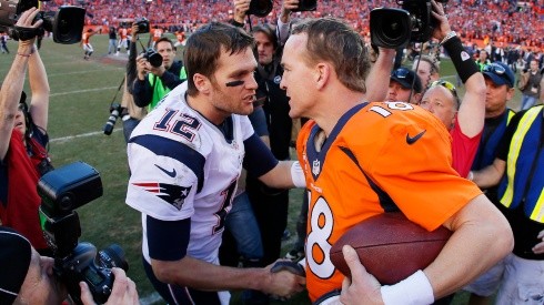 Tom Brady and Peyton Manning after their last duel. (Getty)
