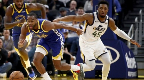 Alec Burks (right) of the Golden State Warriors goes for the ball after he stole it from Donovan Mitchell (left) of the Utah Jazz. (Getty).jpg