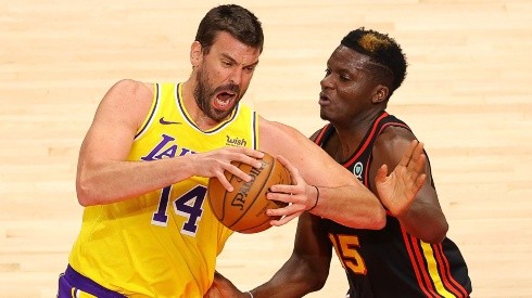 Marc Gasol (left) of the Los Angeles Lakers drives against Clint Capela (right) of the Atlanta Hawks. (Getty)