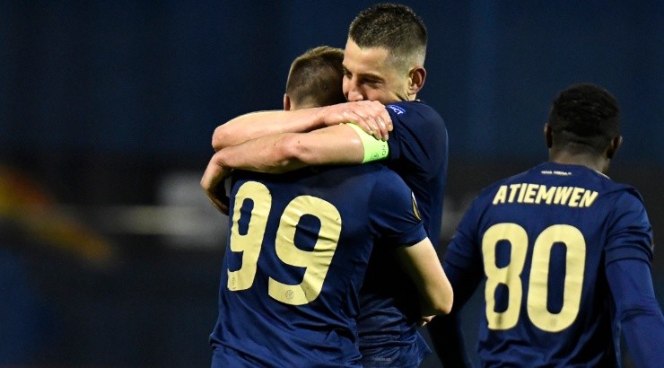 Arijan Ademi and Mislav Orsic of Dinamo Zagreb celebrate against Tottenham. (Getty)