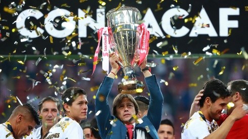 Matias Almeyda of Chivas celebrates with the 2018 CONCACAF Champions League Trophy.