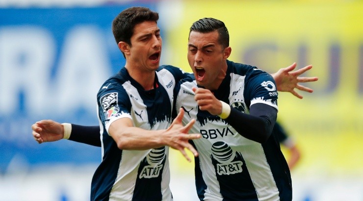 Rogelio Funes Mori (right) of Monterrey celebrates with teammate Stefan Medina (left). (Getty)