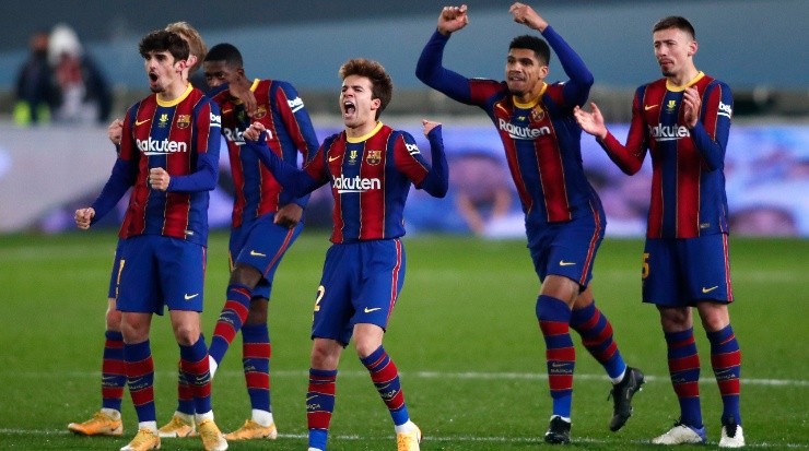 Barcelona players celebrate during a penalty shoot out. (Getty)