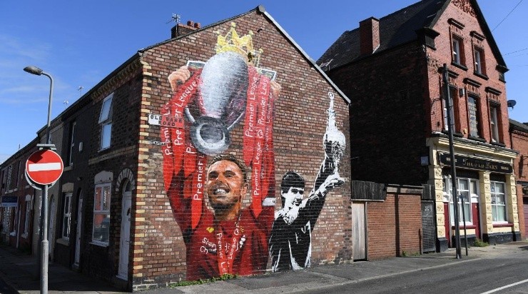 A mural of Jordan Henderson and Alan Hansen is seen on a house near the stadium prior to the Premier League match between Liverpool and Leeds United at Anfield (Getty)