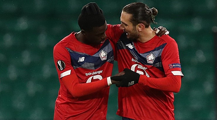 Timothy Weah (left) of Lille celebrates with Yusuf Yazici (right). (Getty)