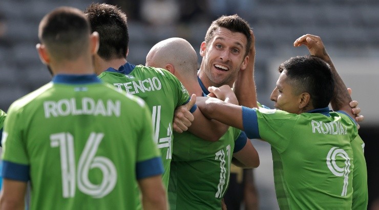 Seattle Sounders players celebrate after scoring a goal. (Getty)