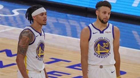 Damion Lee y Stephen Curry