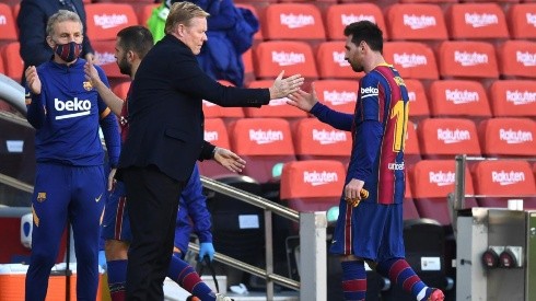 Ronald Koeman y Lionel Messi durante un encuentro con Barcelona.