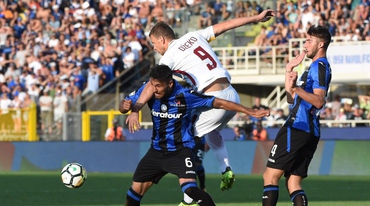 Jose Luis Palomino of Atalanta BC competes for the ball with Edin Dzeko of AS Roma (Getty)