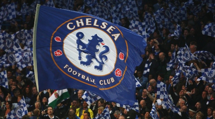 A Chelsea flag is waved during a game. (Getty)