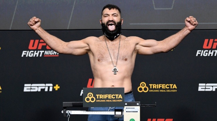 Andrei Arlovski of Belarus poses on the scale during the UFC weigh-in (Getty)