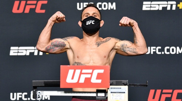 Frankie Edgar poses on the scale during the UFC weigh-in at UFC APEX