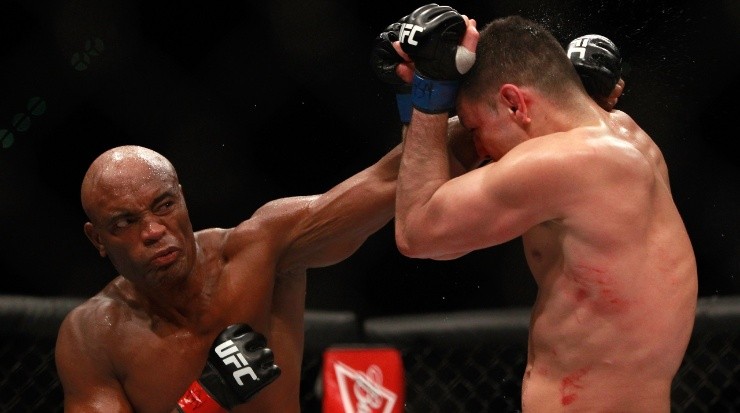 Anderson Silva punches at Nick Diaz in their middleweight bout (Getty)