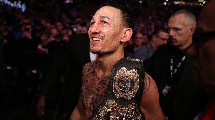 Max Holloway of the United States leaves the octagon after defeating Brian Ortega (Getty)